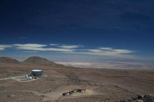 The Atacama Cosmology Telescope sits in an expanse of desert.