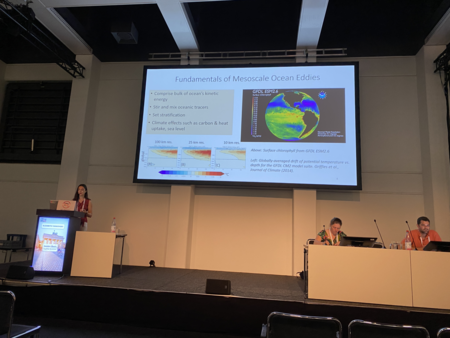 Elizabeth Yankovsky, incoming FAS faculty member and Associate Professor of Earth and Planetary Sciences, presents her research. She stands in front of a slide titled &quot;Fundamentals of Mesoscale Ocean Eddies.&quot;