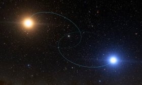  Illustration of a binary star system, with a yellow star depicted in the upper left corner of the image, and a blue star depicted in the lower right. Image credit: The European Space Agency,