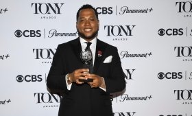 Branden Jacobs-Jenkins poses with the Tony award he won on June 8, 2025, for his play "Purpose." Photo courtesy: Evan Agostini / AP