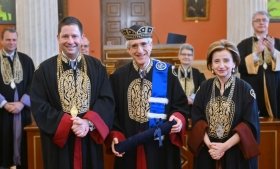 NKUA Rector Professor Gerasimos Siasos, left, former Yale President Peter Salovey, and Professor Pagona Lagiou, dean of the NKUA School of Health Sciences, wear ceremonial regalia during the June 15 ceremony in Athens, Greece.