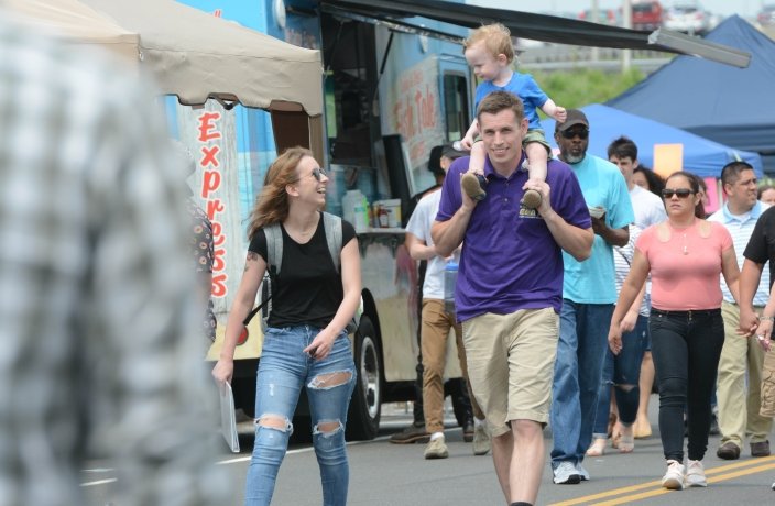 Family attends a Food Truck Festival