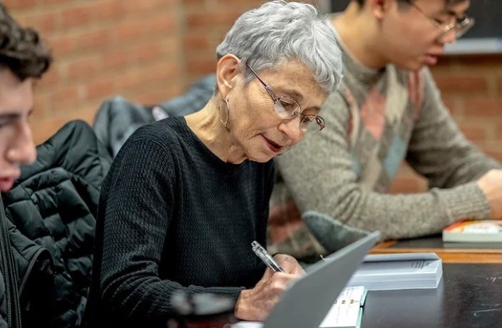 Faculty member, Ruth Yeazel, participating in a class