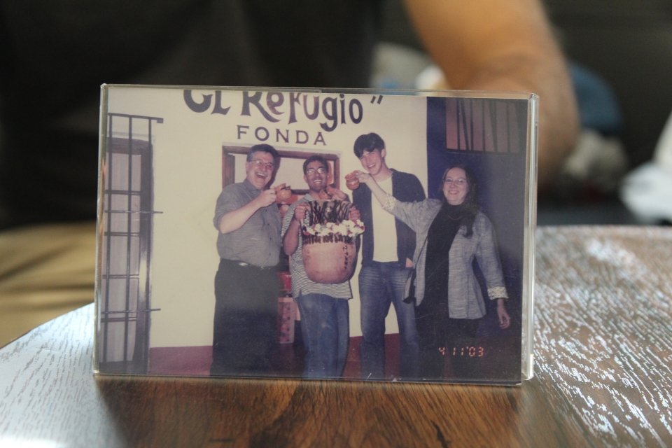 Professor Jacques Gauthier, Bhart-Anjan Bhullar, graduate student Krister Smith and chief paleontology preparator Marilyn Fox standing outside the restaurant “El Refugio” Fonda in Mexico City, 2003