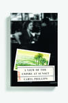 Cover of  the book A view of the empire at sunset, by Caryl Phillips. It shows a black and white photograph of a woman and a man talking at what seems to be a bar, but the whole picture is blurry. On the bottom half, there is a postal card showing a painting of a landscape and some palm trees. 